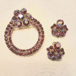 Vintage rhinestone demi set. Clip on earrings and brooch.
